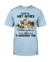 Love is wet noses slonnery kisses and a wagging tail